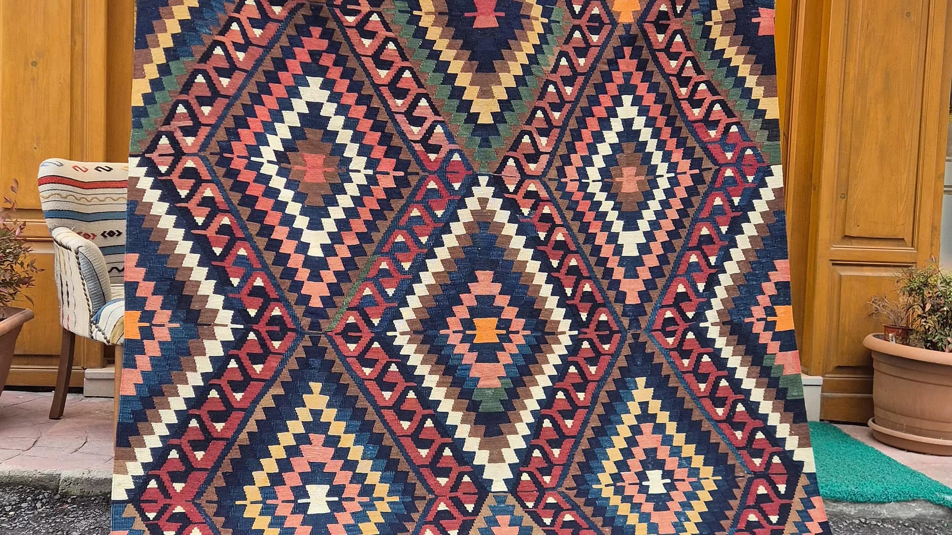1950s Turkish handwoven kilim in earthen hues designed for rustic and Scandinavian settings