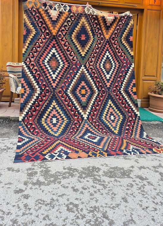 Vintage Manisa kilim with diamond patterns for mid-century living room