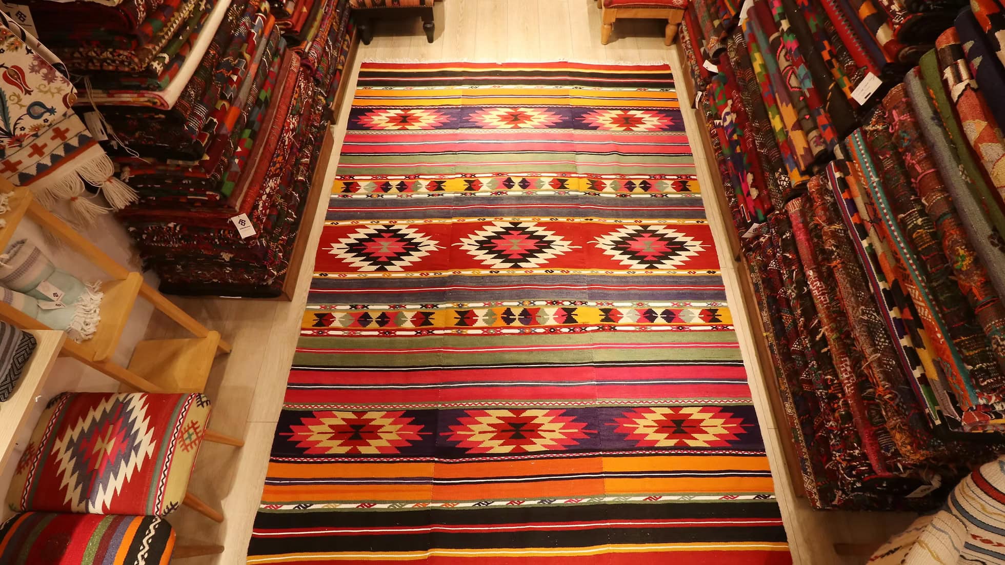 Kilim Couture New York's handwoven vintage Turkish wool kilim rug, 6x9, featuring Southwestern geometric patterns.
