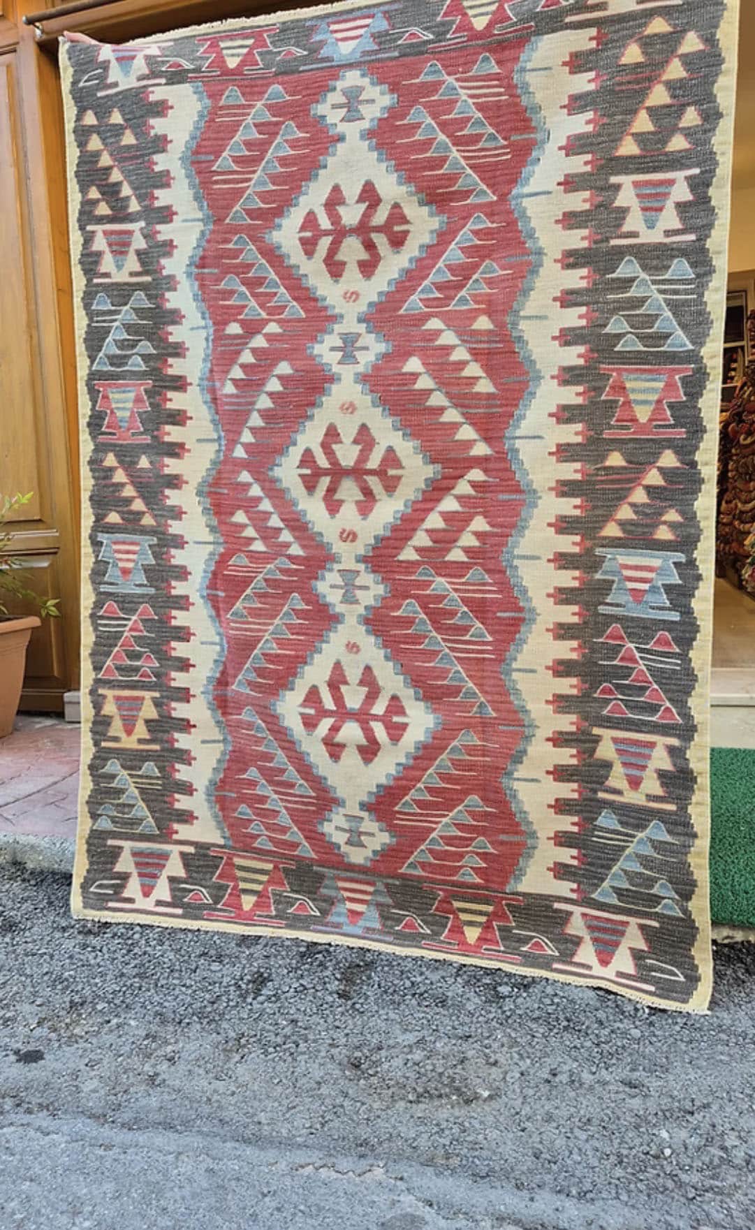 Vintage Turkish Oushak kilim with warm earthy tones and geometric Southwestern patterns, perfect for boho, modern rustic, or curated designer interiors.