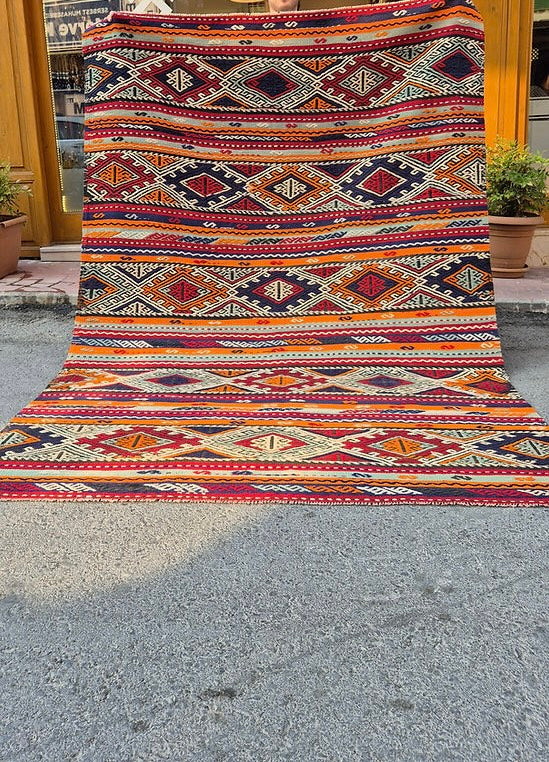 Handwoven vintage Manisa Cecim Kilim rug showcasing richly textured tribal geometric patterns.