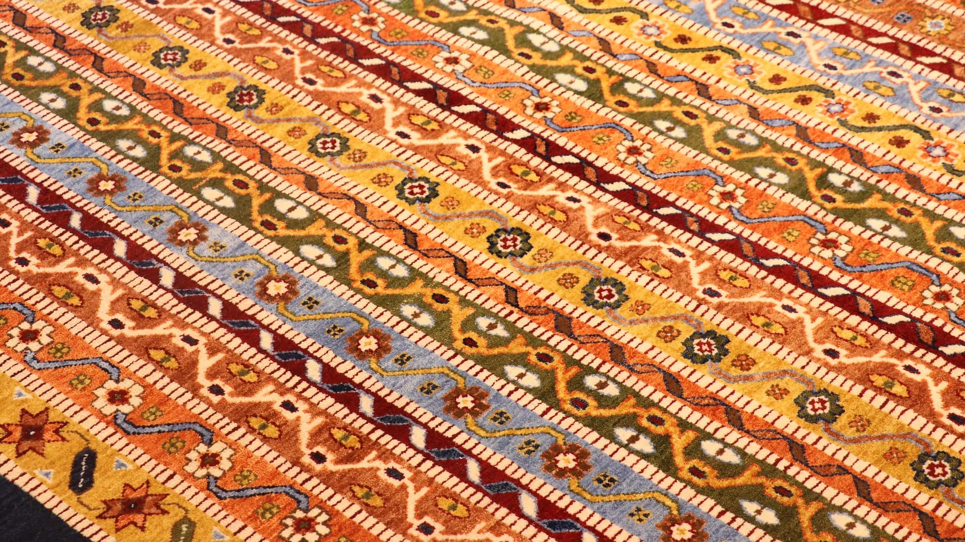 Turkish oriental ottoman palace style royal carpet in earthy tones with floral patterns in detail