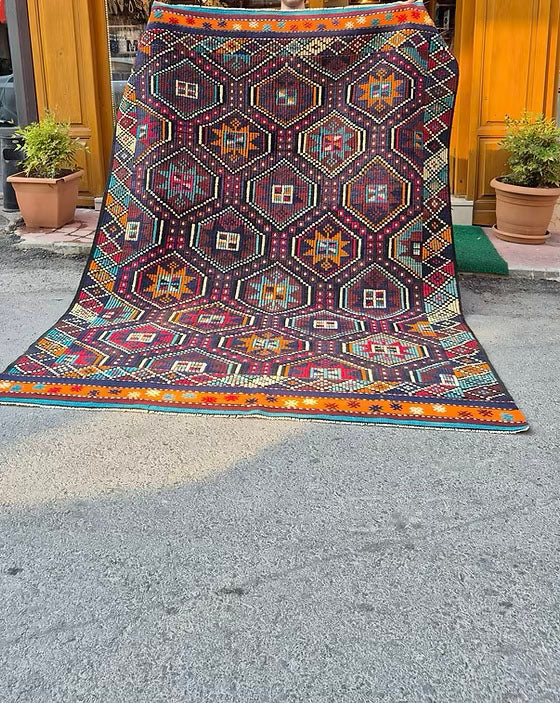 Large vintage rug by Kilim Couture New York Rug Store, ideal statement rug for open concept living rooms, lofts, entryways, and high-end home staging