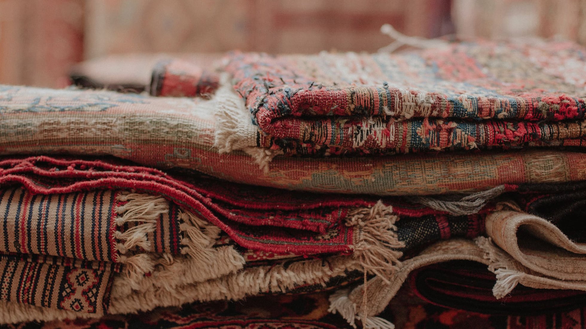 Handmade folded red Turkish Kilim Rugs in traditional patterns and colors