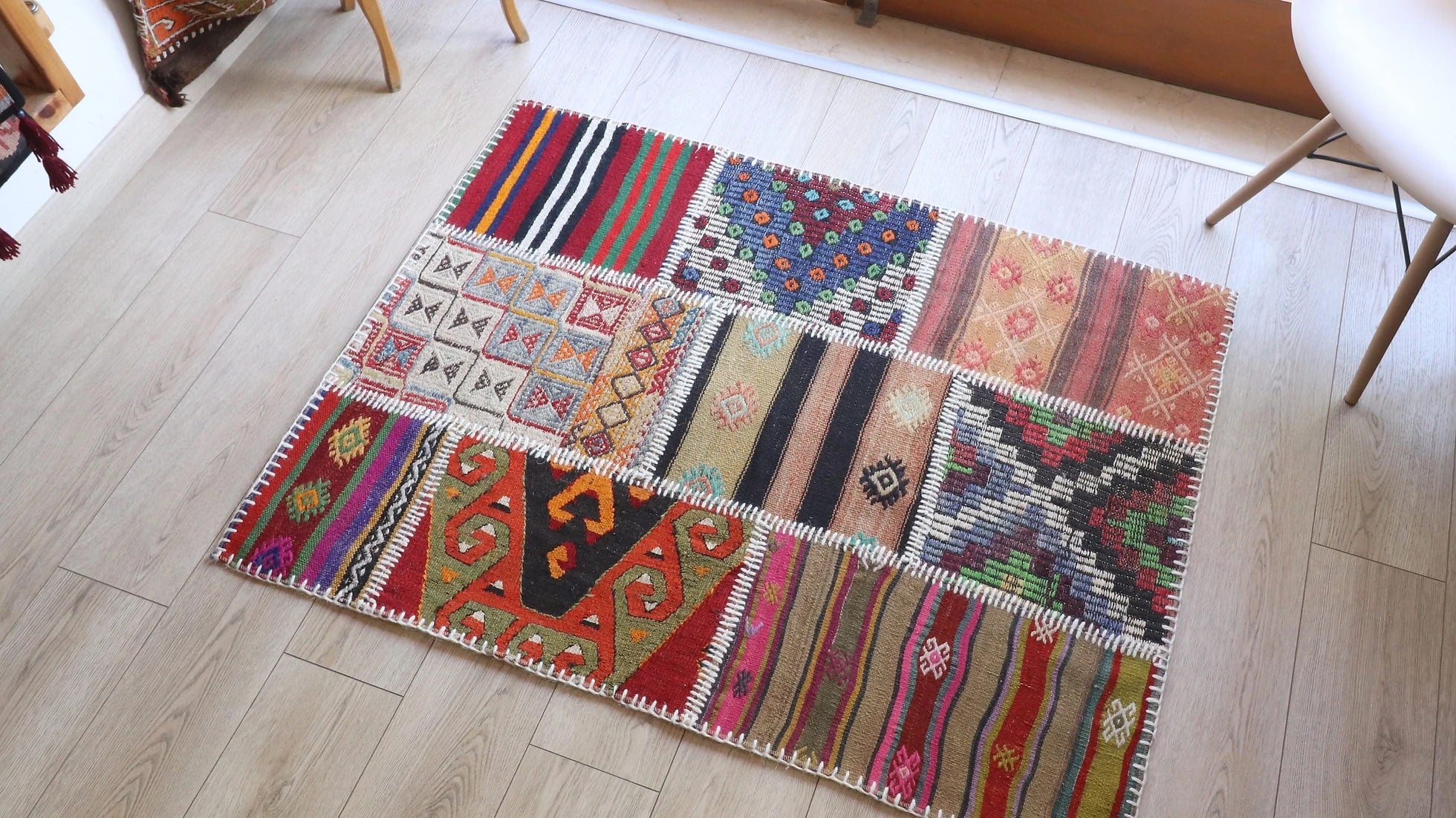 vintage handmade Turkish patchwork kilim rug in colorful geometric patterns