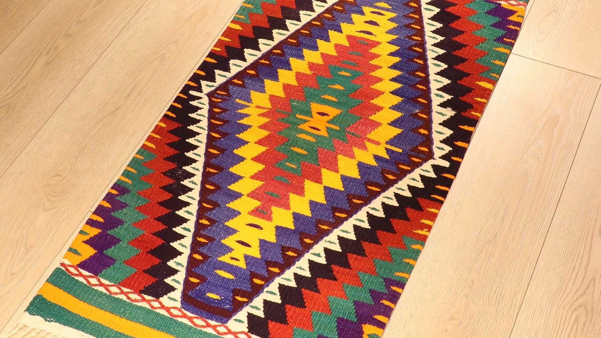 handwoven small area kilim rug in vivid and vibrant color hues