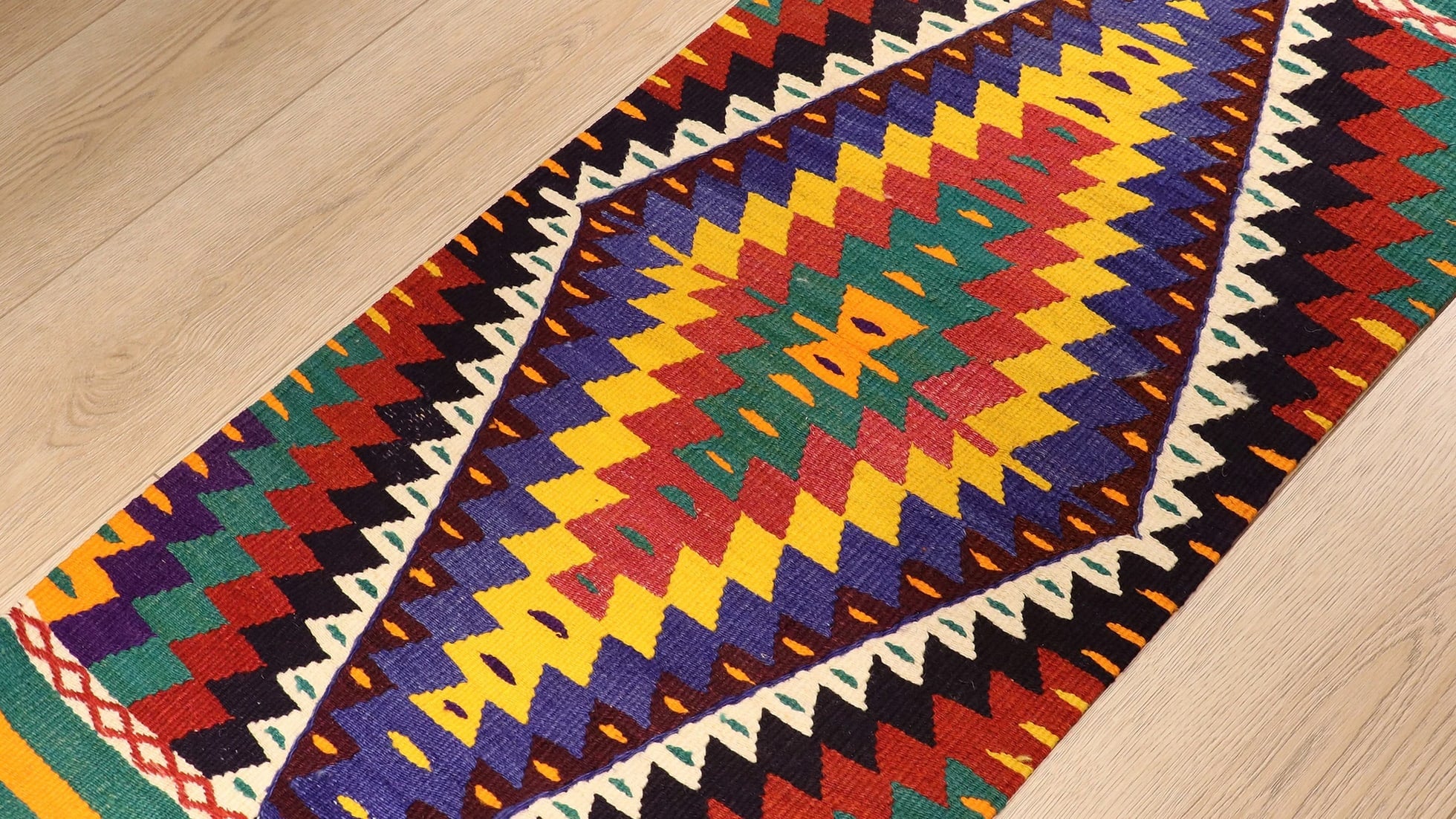hand knotted small area Kilim Rug in vivid and vibrant color hues