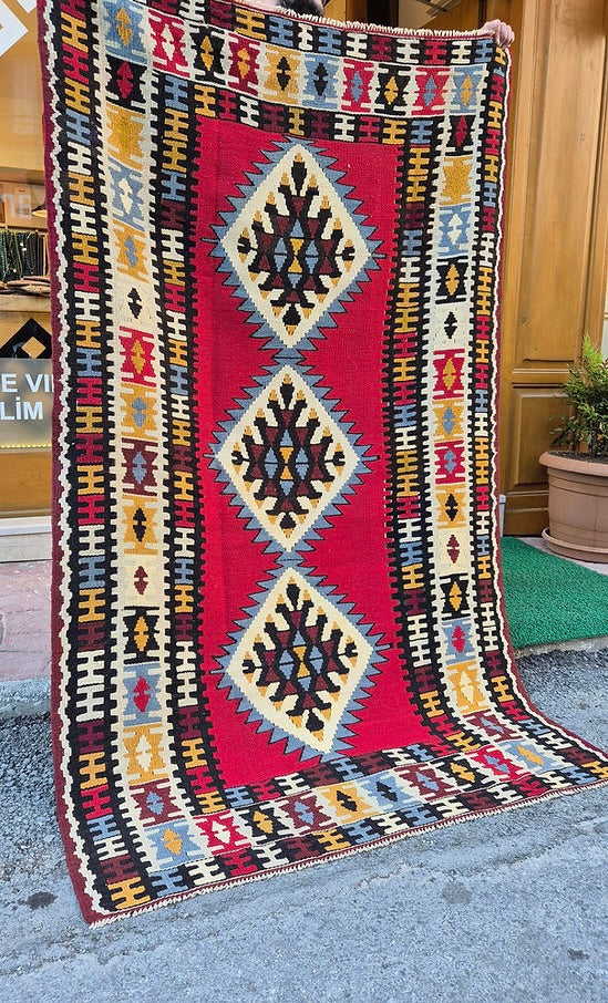 Luxury Oushak kilim rug 4x6 in crimson and earth tones, ideal for living room or office décor