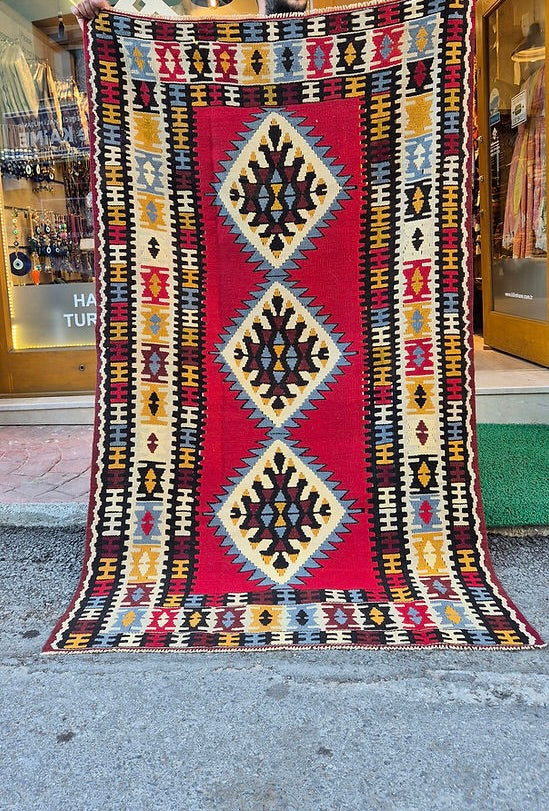 Wool and cotton flat-weave Oushak rug featuring traditional Scorpion motifs from Turkey