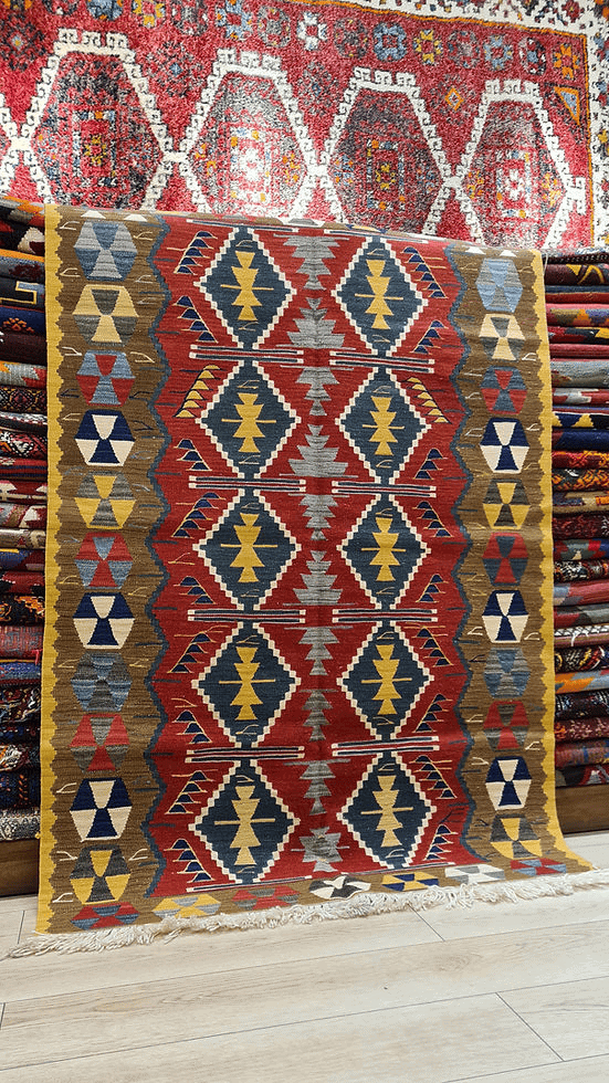 Trendy rugs 2025 by Kilim Couture New York — handwoven Usak rug with geometric design, perfect for modern and eclectic interiors
