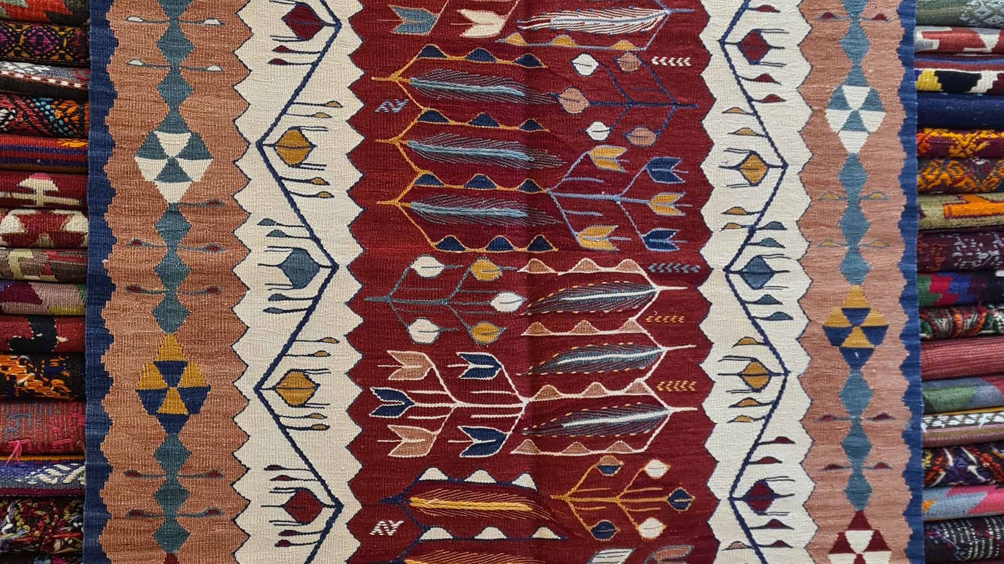 Handwoven Turkish Kilim Rug with Stylized Tulips – Oushak Flat-Weave in Ottoman Crimson by Kilim Couture New York Rug Showroom