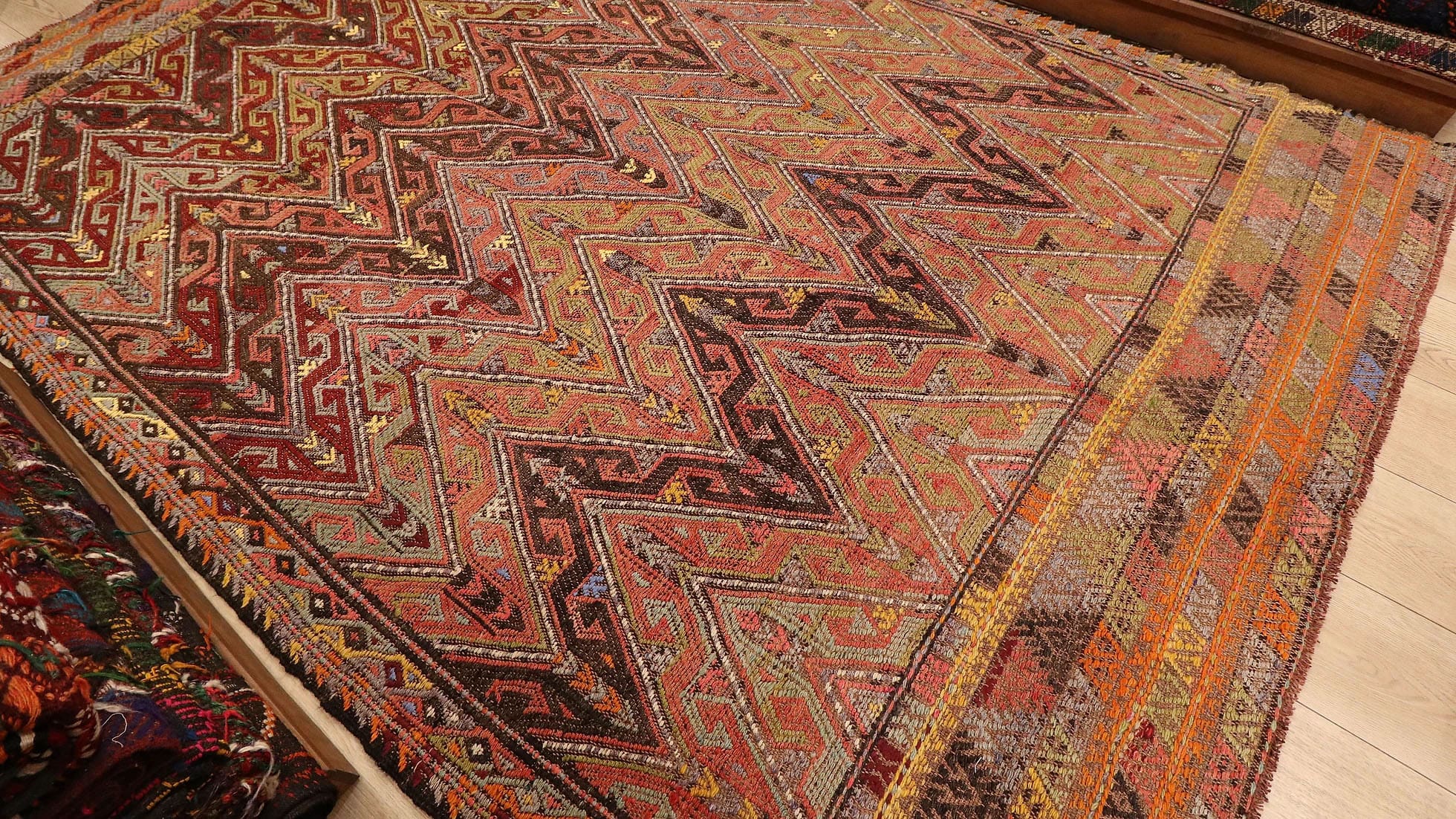 vintage tribal Kurdish ikat rug in brown tones