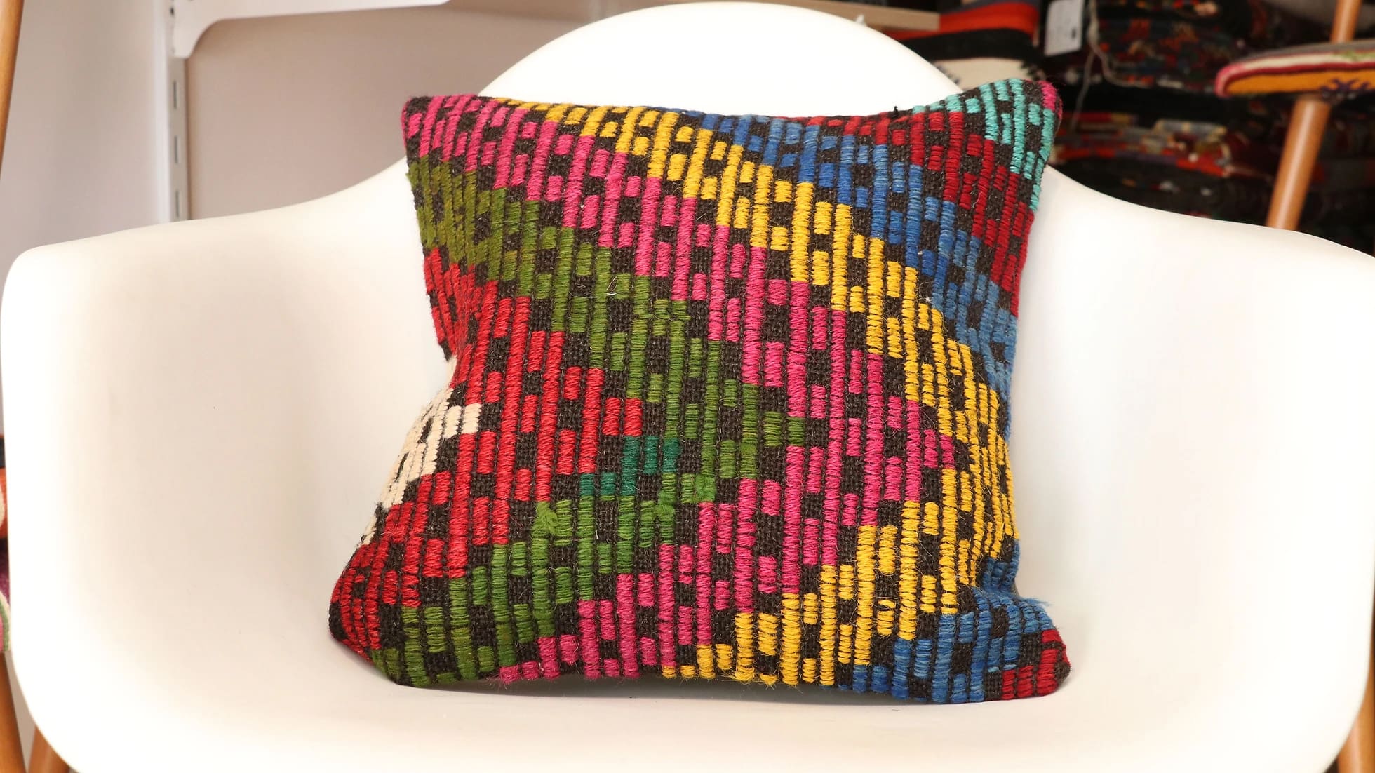 kilim upholstered pillow woven by local women artisans in colorful cecim style