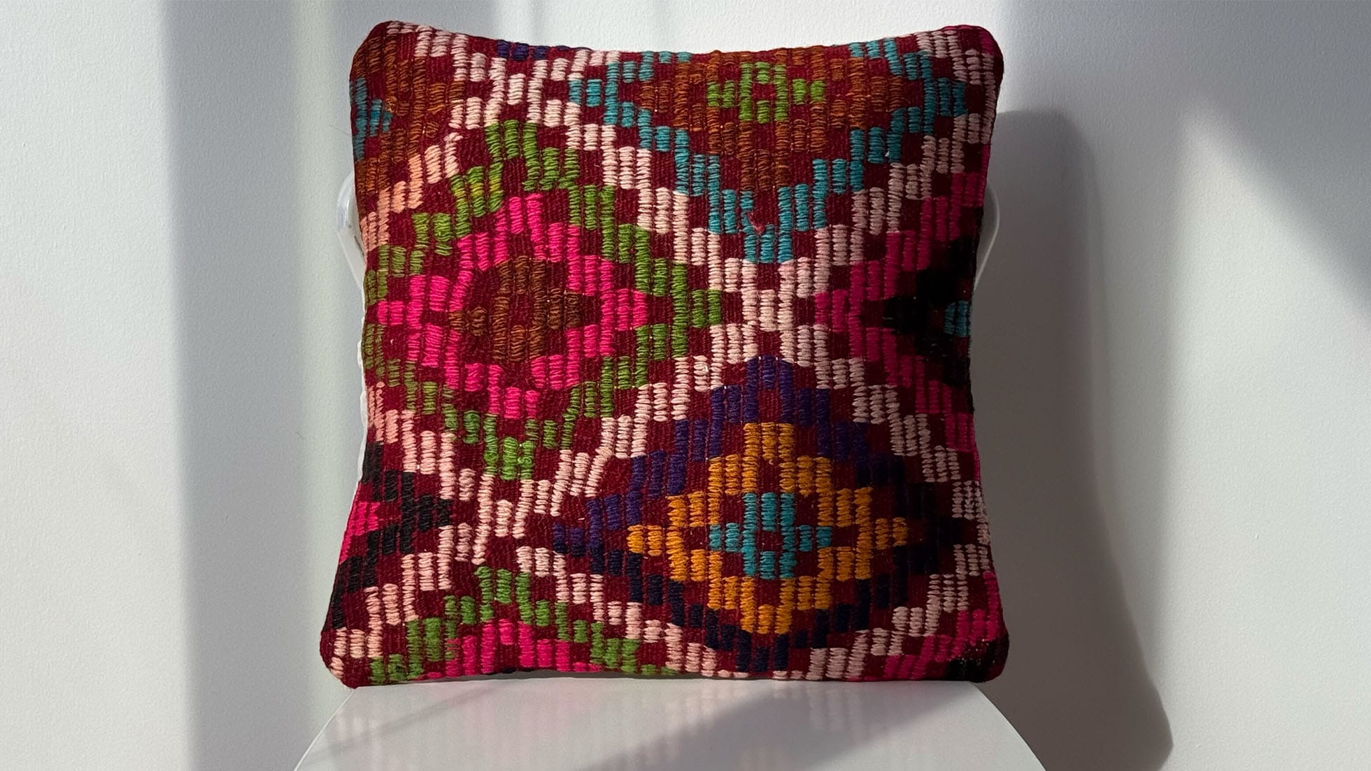 16x16 Vintage Handwoven Kilim Decorative Throw Pillow with Polychromatic Palette of Cream, Pink, Green, Orange, Red, and Purple, showcasing intricate Turkish cecim embroidery-style weaving.