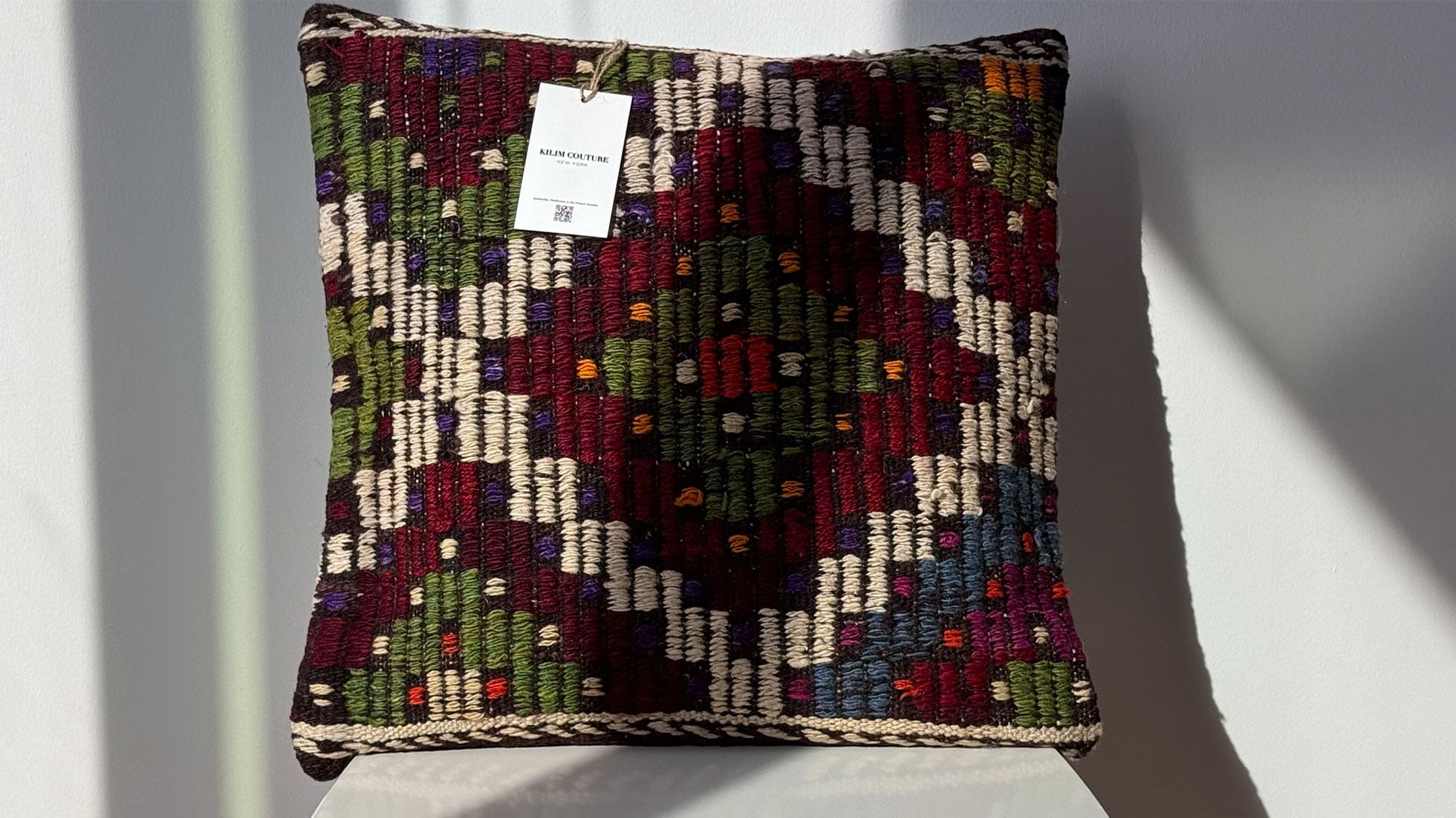 16x16 Vintage handwoven Cecim kilim pillow with geometric patterns in Bordeaux, deep blue, and khaki green. Crafted using traditional Turkish techniques, this textured throw pillow adds cultural depth and rustic charm to any décor.