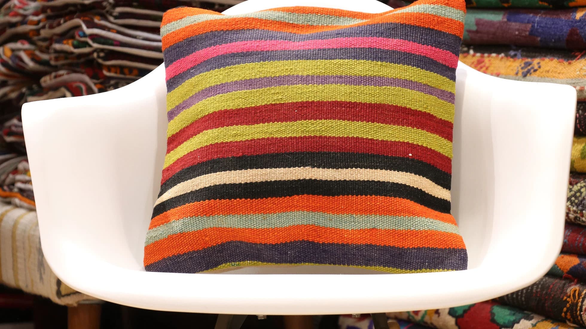 Sustainable Turkish Kilim Pillow with colorful striped pattern, adding texture and charm to rustic, boho-chic, and modern interiors.