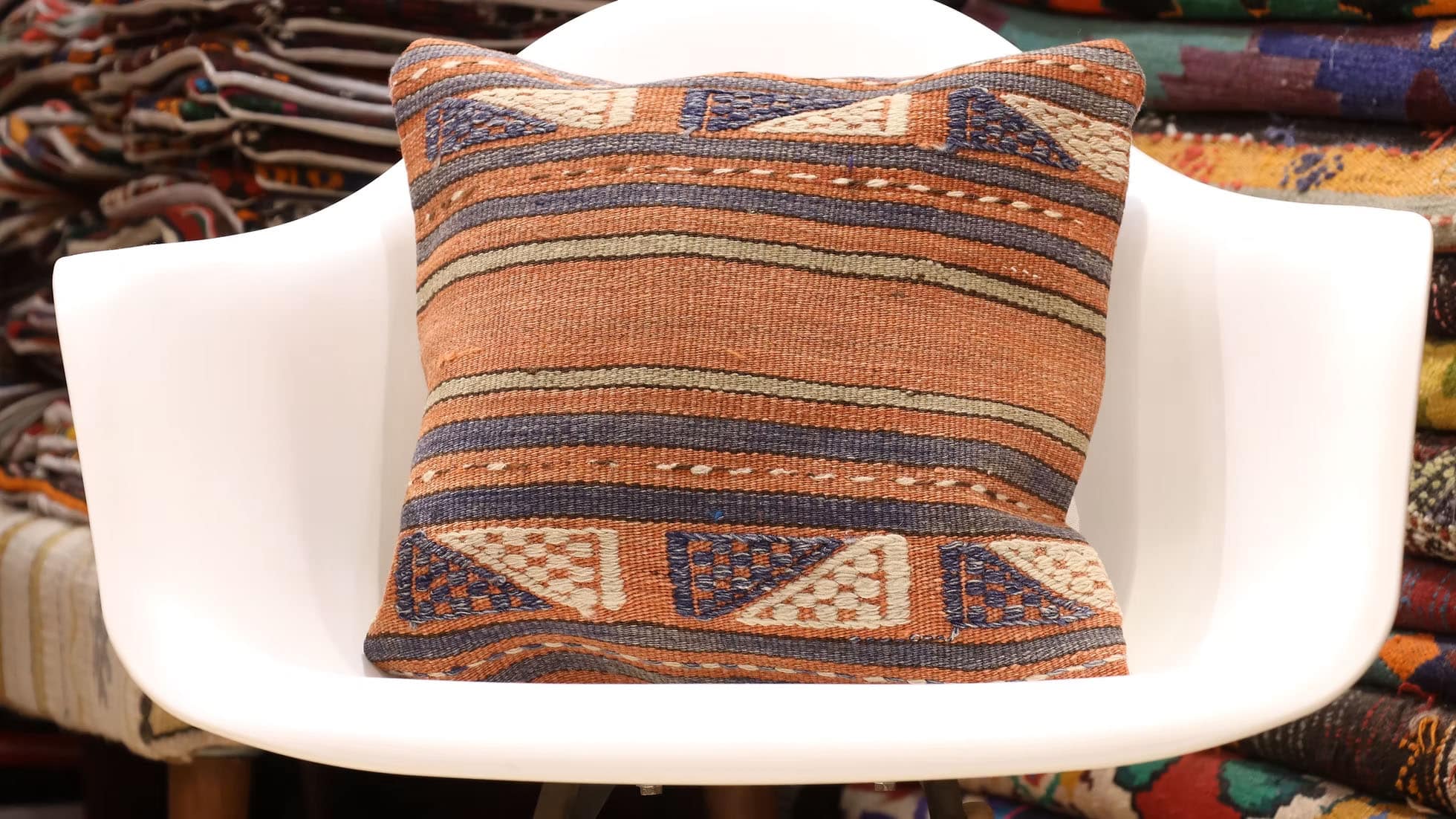 Vintage Handwoven Kilim Pillow. Crafted from authentic Turkish kilim fragments, this unique decorative pillow features a soft taupe background with delicate khaki, gray, and beige motifs. Perfect for modern, boho-chic, or rustic interiors, it adds cultural authenticity, texture, and warmth to any space.