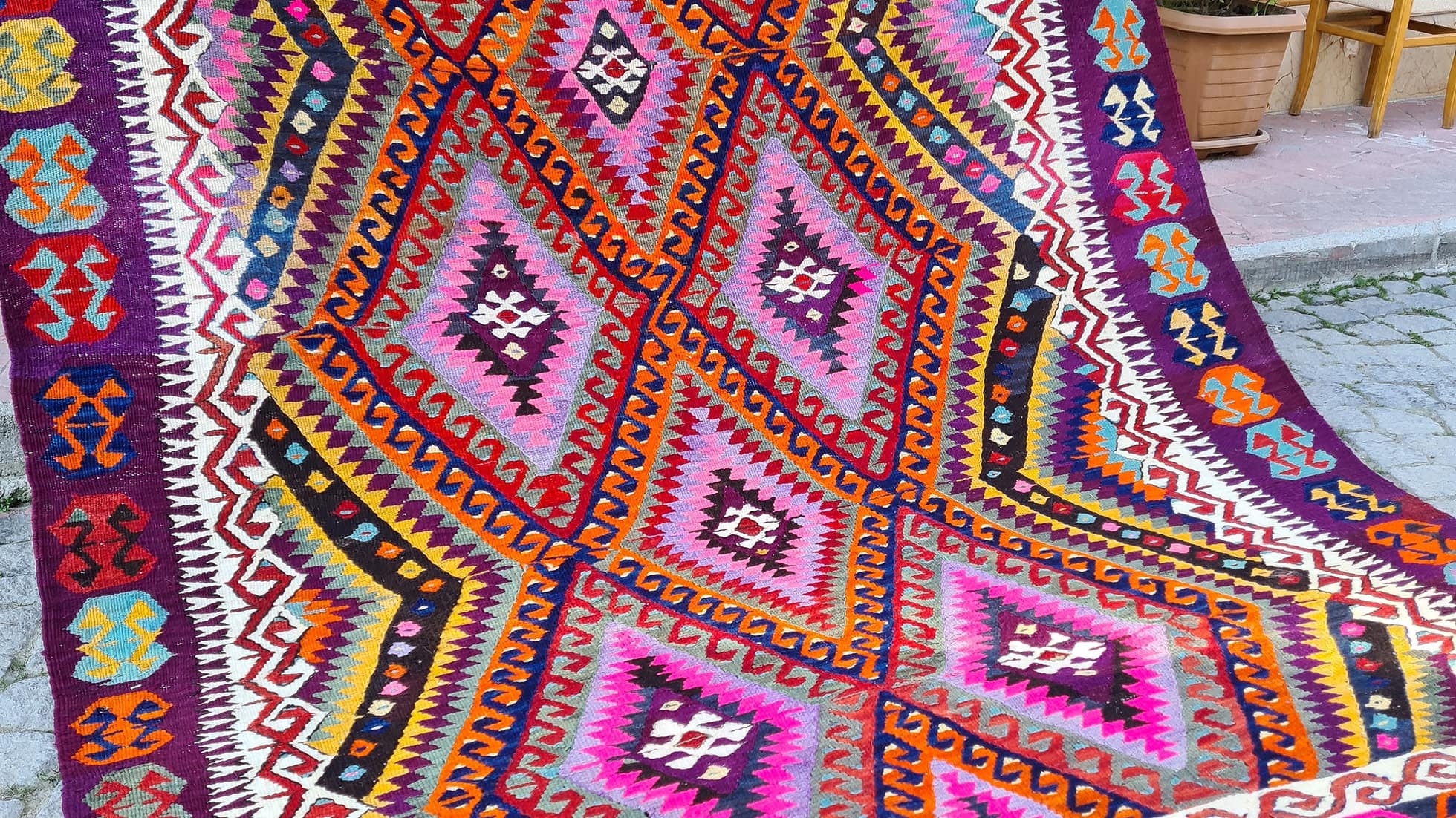 Polychromatic Vintage Turkish Rug with geometric patterns