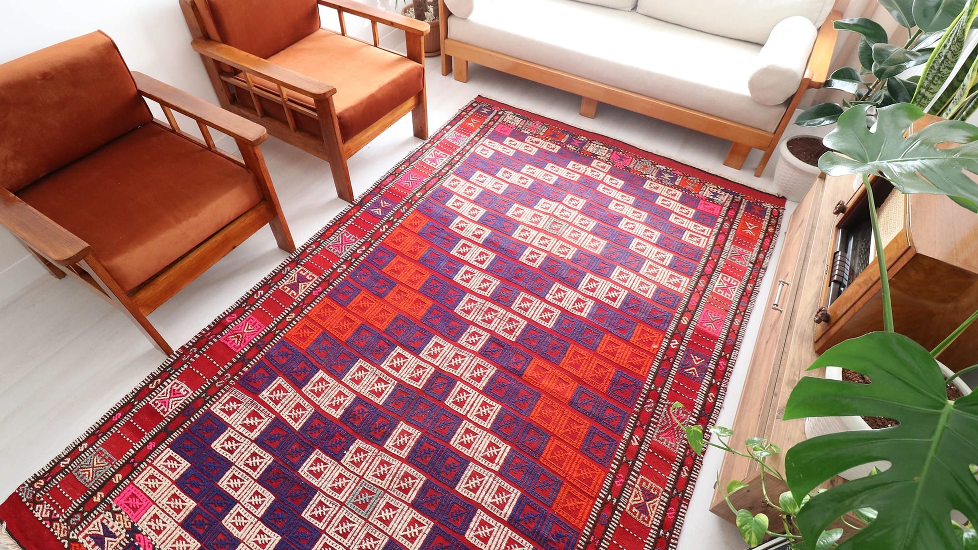 Vintage hand woven Cecim Kilim Rug with vibrant hues in pink, red and purple