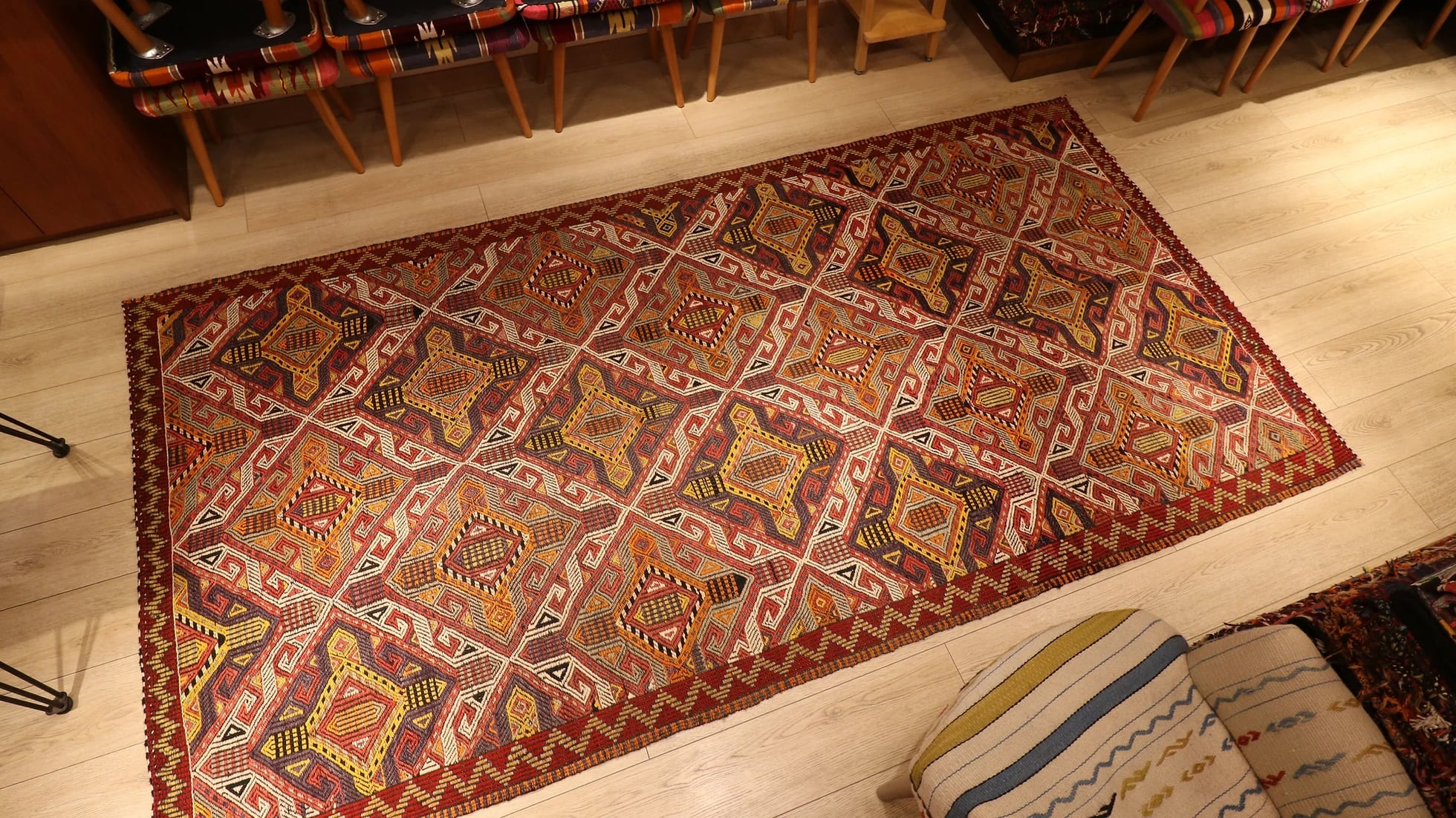 a very captivating Cicim rug from Turkey in natural earthy color palette with many all over traditional geometric patterns and motifs