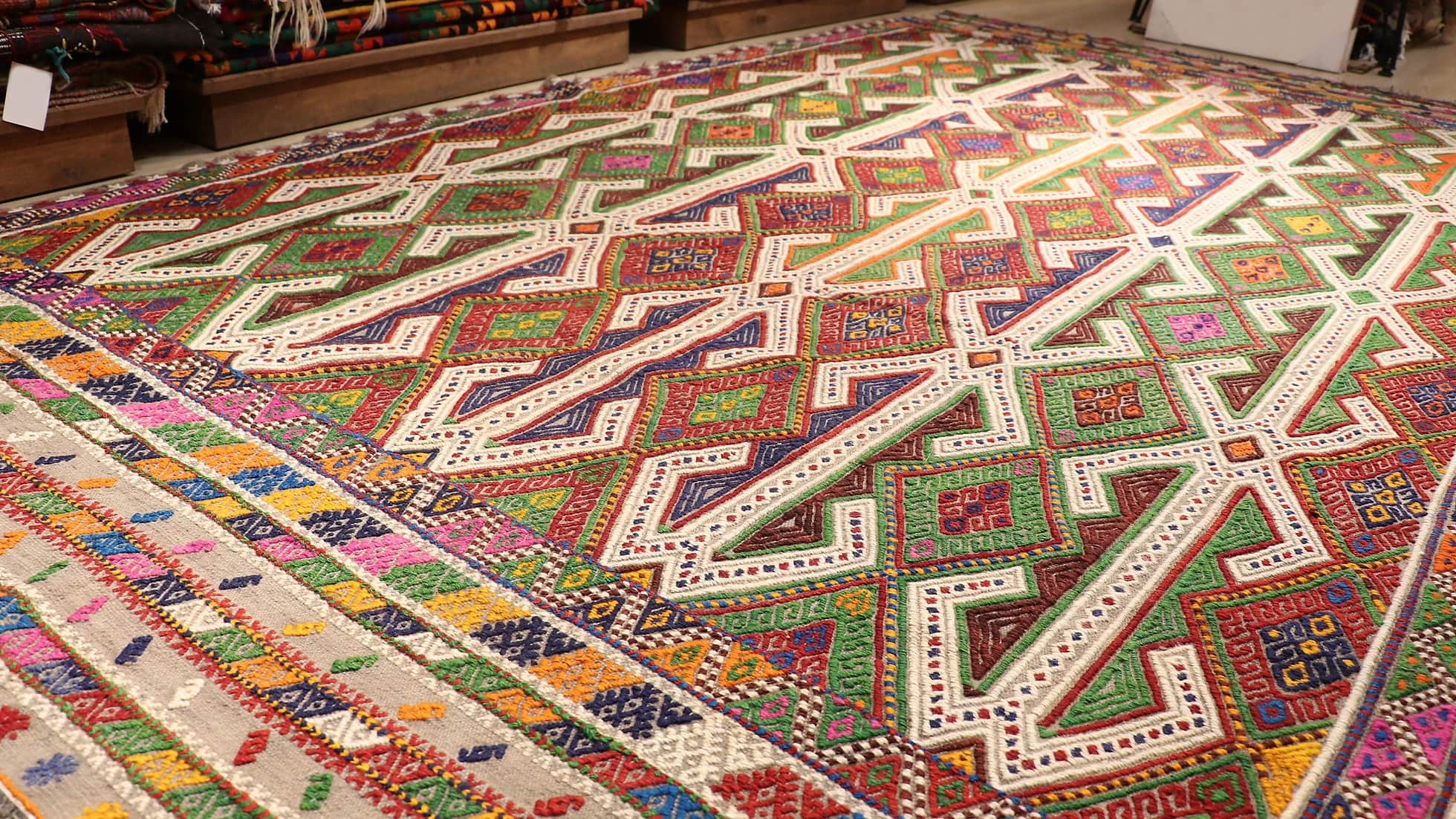 eclectic handwoven wool area rug measuring 6x10