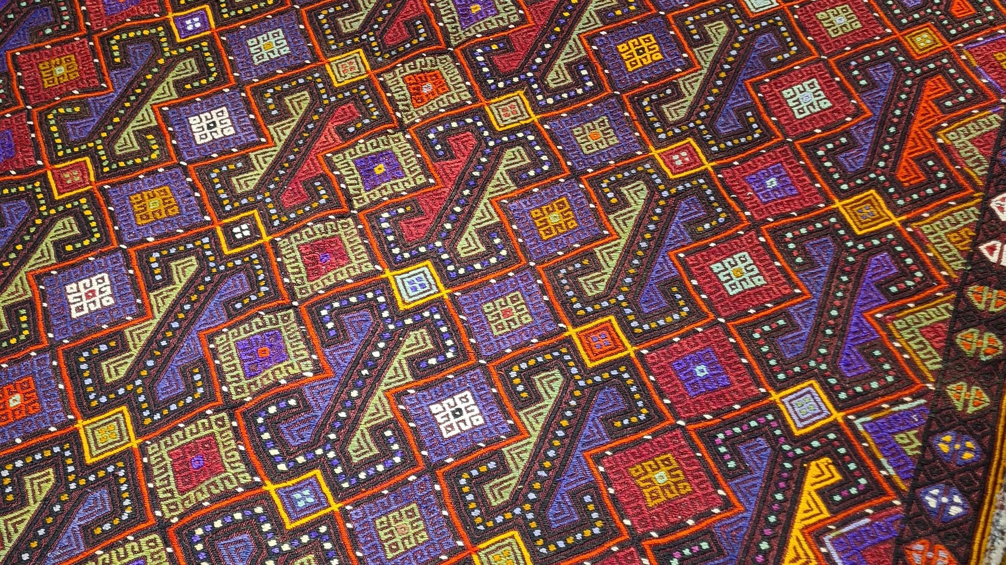 Vintage 1960s Cecim carpet from Turkey featuring rich aubergine, tangerine, and olive tones—perfect for rustic farmhouse interiors.