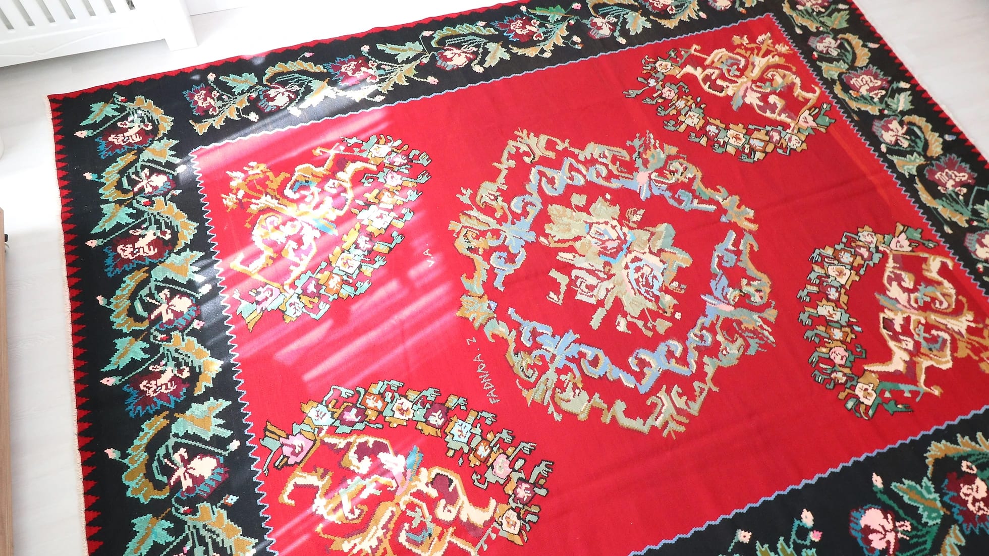 Vintage Handwoven Bessarabian Kilim Rug in red shades with floral design signed by the artisan
