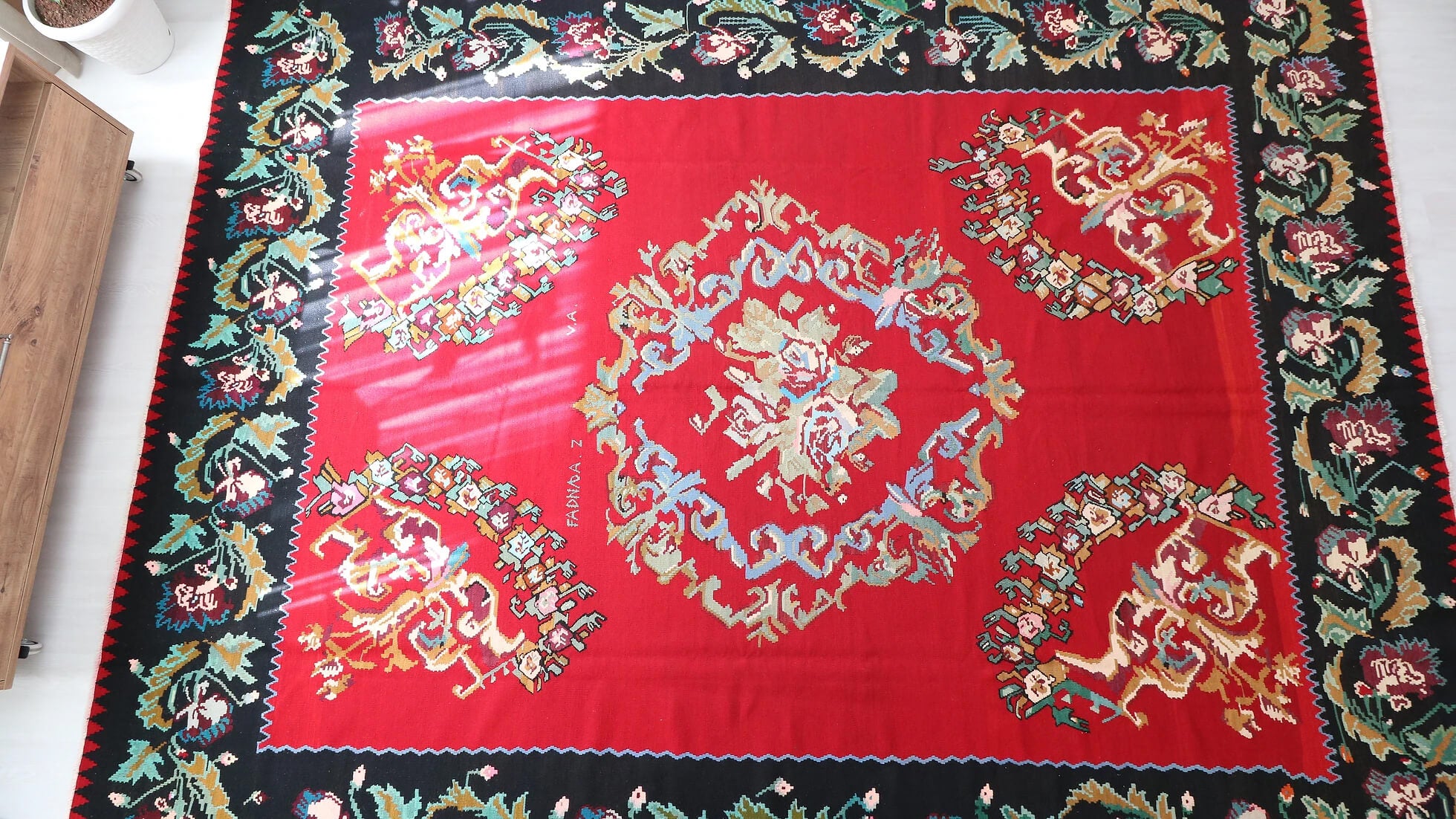 Vintage Handwoven Bessarabian Kilim Rug in red shades with floral design signed by the artisan