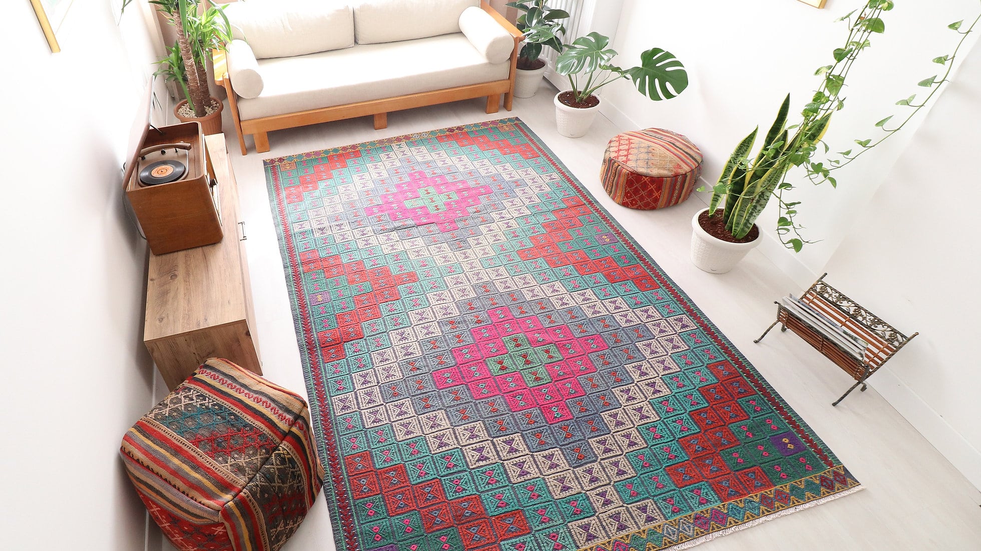 Vintage hand woven Cecim Kilim Rug with faded hues in pink, red and green