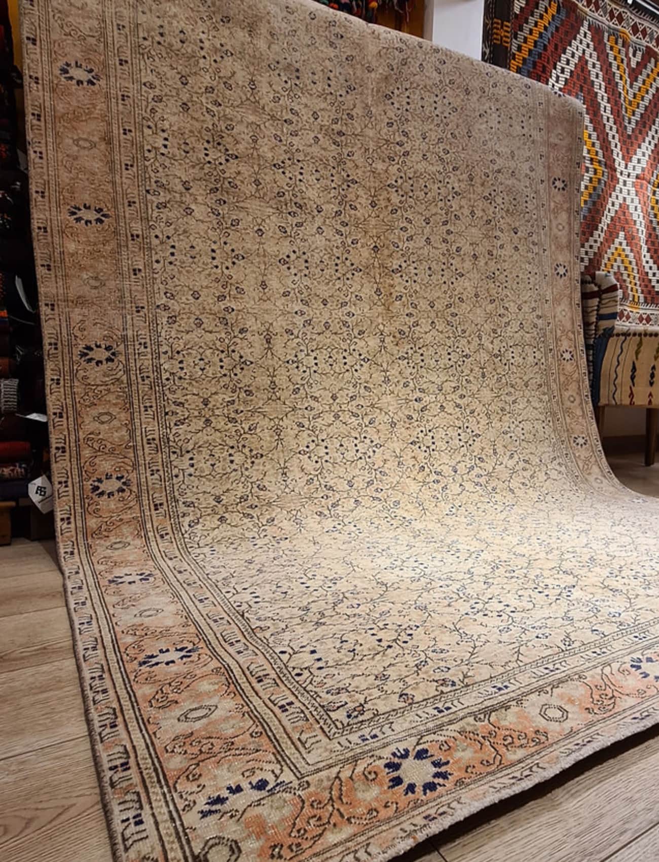 gallery size famous Bunyan oriental rug in beige and ivory with floral motifs and patterns from Turkey