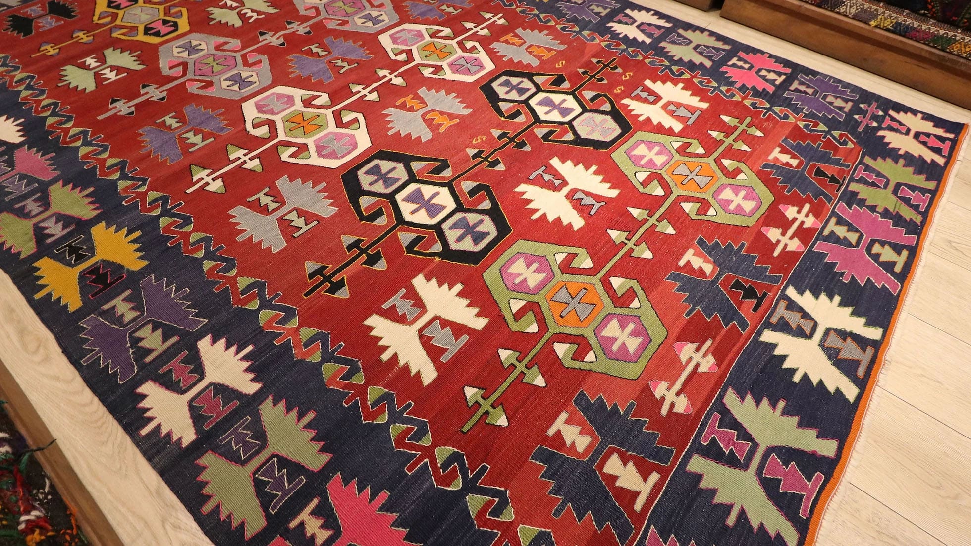 beautiful nomadic tribal flat-woven rug from Denizli, Turkey in red and blue geometric traditional motifs