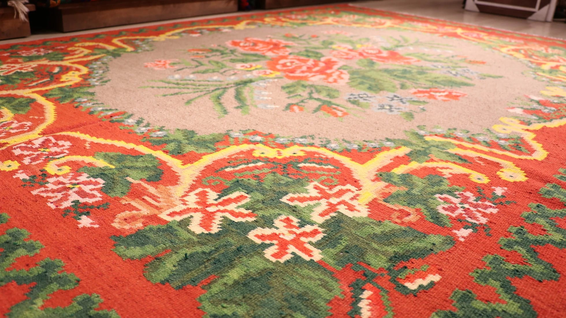 gorgeous Moldovan European tapestry rug from Turkey in flower motifs, floral patterns, and geometric medallion in red, green, yellow, and gray