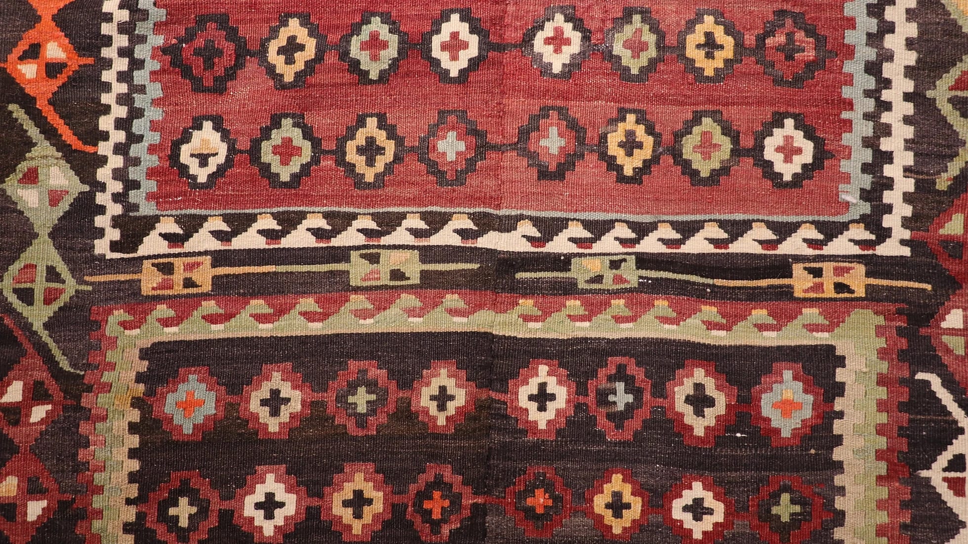 cross, love and yin-yang motifs on vintage Kurdish Kilim Rug