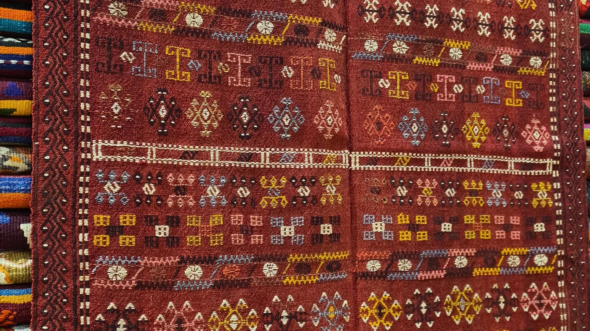 Kilim Couture New York Vintage Moroccan Handwoven Rug, 3x5 ft, showcasing tribal geometric patterns in muted earthy shades, a designer’s dream piece.