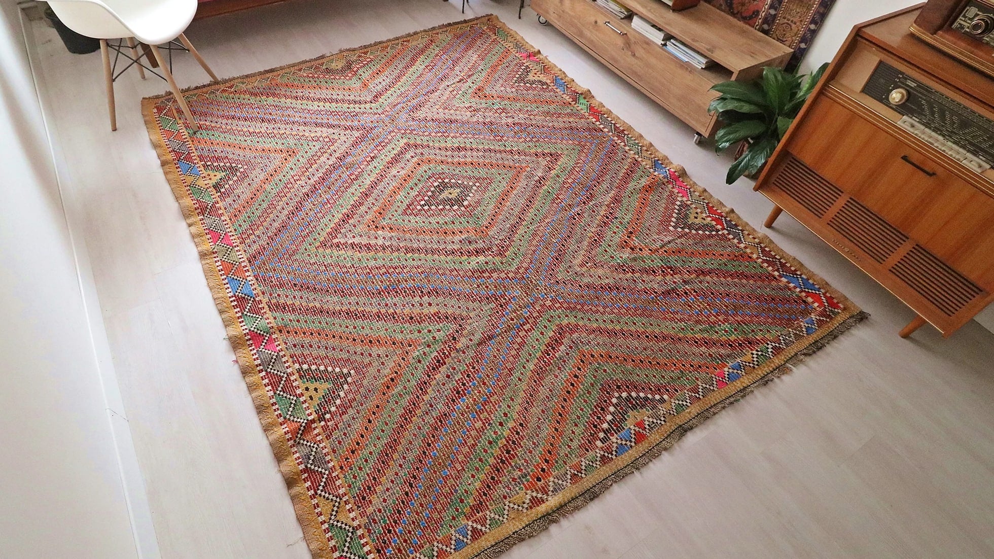 muted hand-knotted vintage Soumak Turkish Kilim Rug in earthy tones