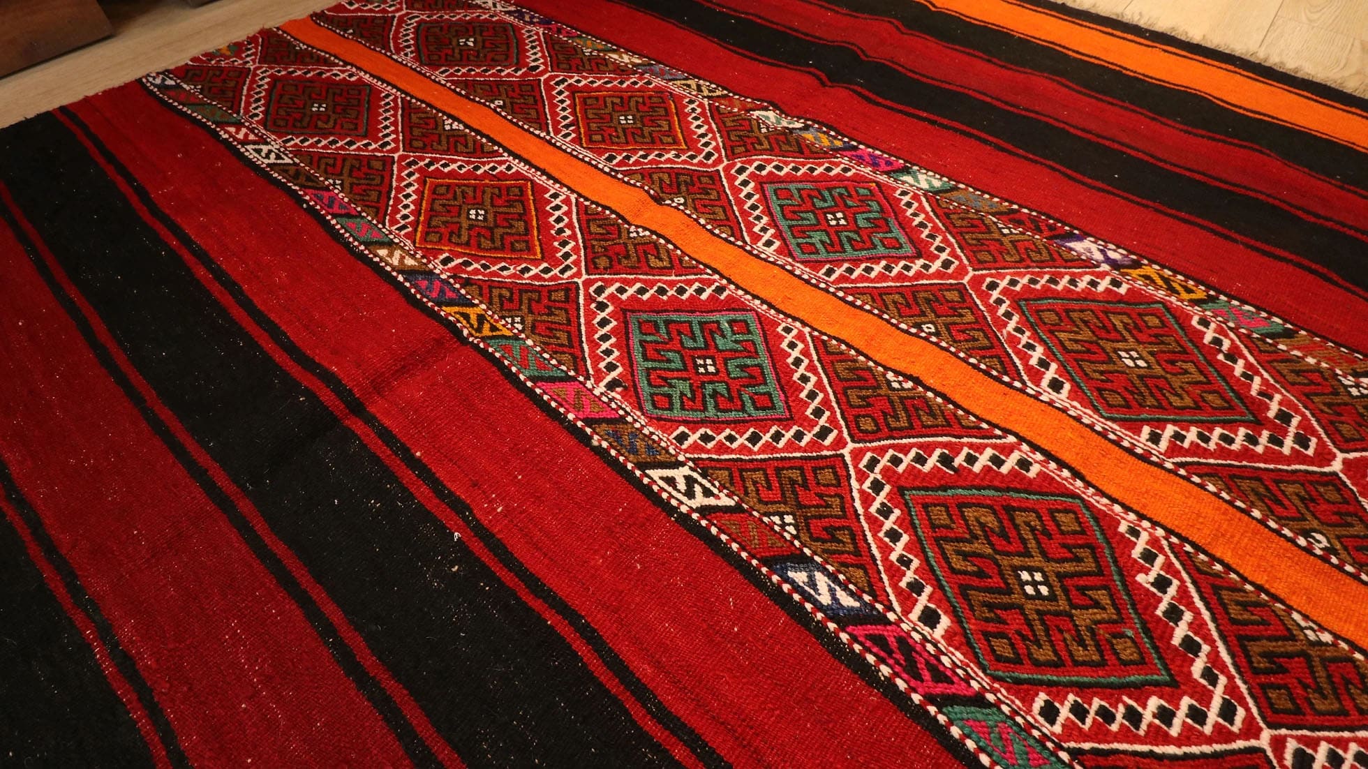 vintage traditional Turkish zili cuval flat rug in tribal motifs and vibrant colors