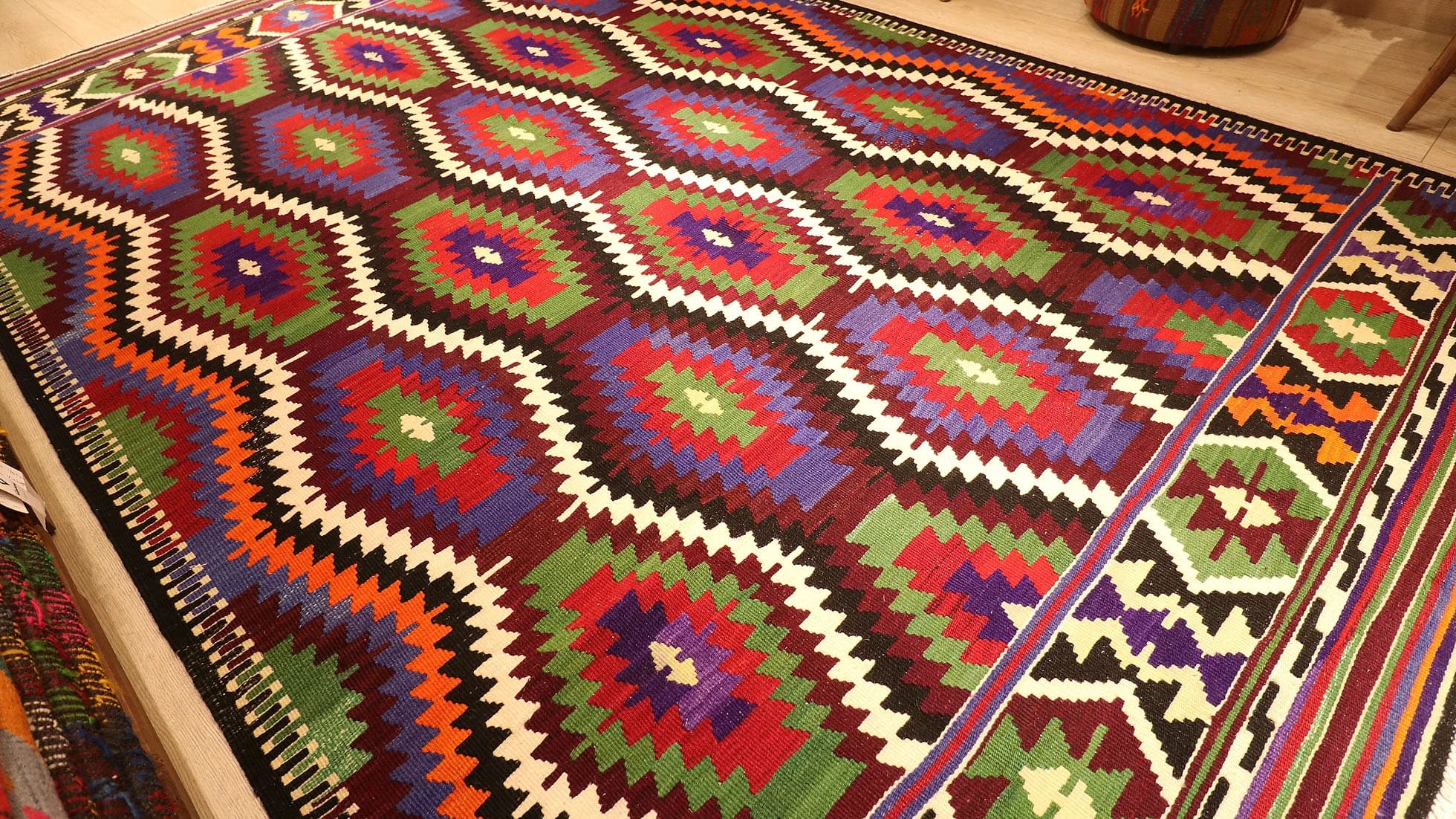 vibrant and vivid colorful Antalya meditteranean kilim rug in tribal diamond and lozenge motifs
