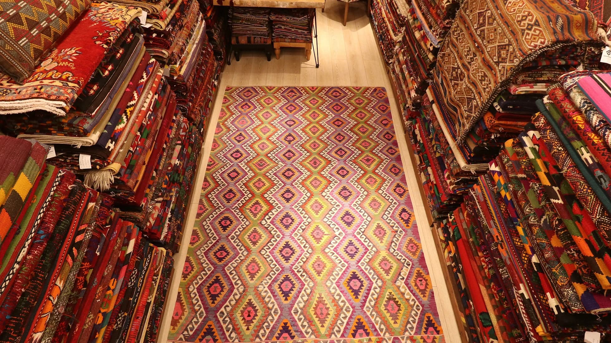 a magnificent mid-century Turkish tribal rug from Antalya in pastel diamond motifs, circa 1950s by Kilim Couture New York