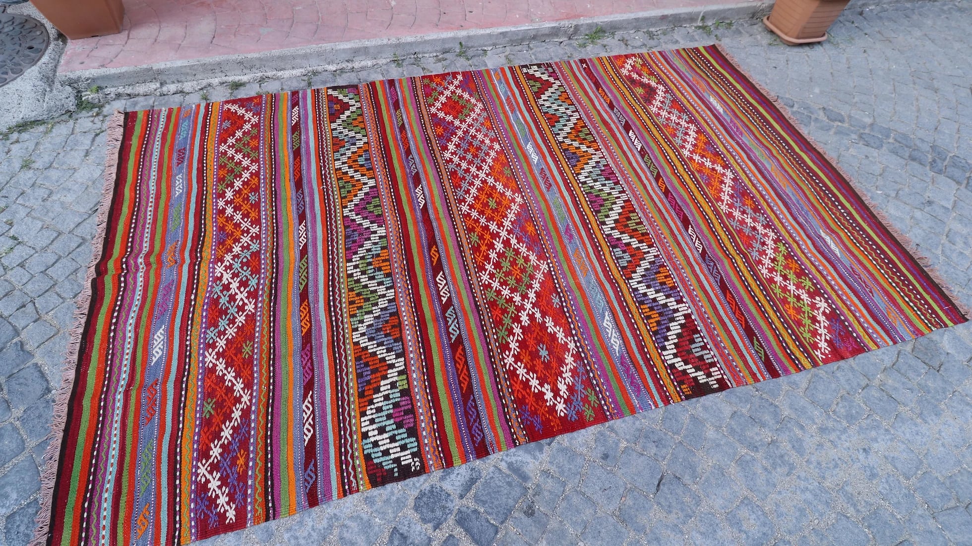 very colorful and pleasing layered and striped balikesir nomadic kilim rug in yoruk style