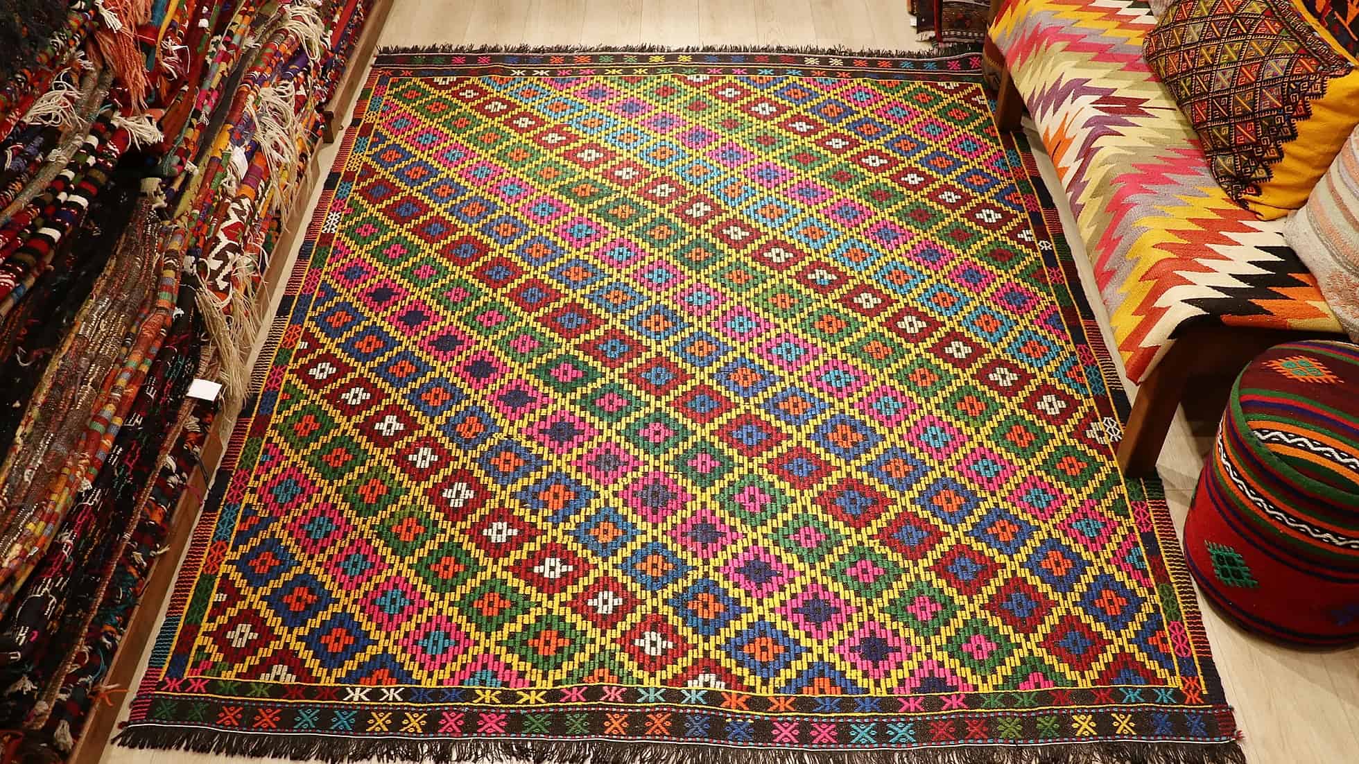 vintage mid-century geometric cecim rug with diamond patterns in vivid and vibrant colorful hues by Kilim Couture New York