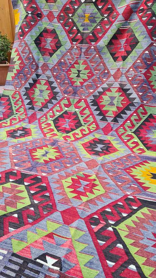 vintage Turkish handwoven tribal and geometric kilim rug from Manisa in rich rustic tones