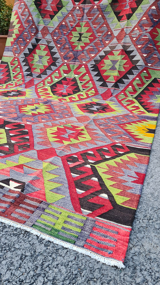 vintage Turkish handwoven tribal and geometric kilim rug from Manisa in rich rustic tones