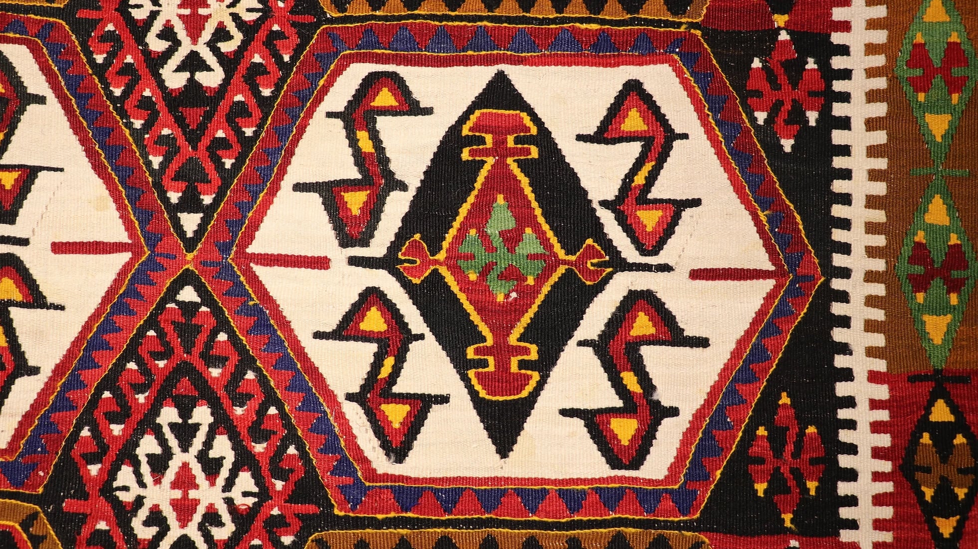 vintage handwoven flat-weave maras kilim rug with many geometric patterns in many traditional colors