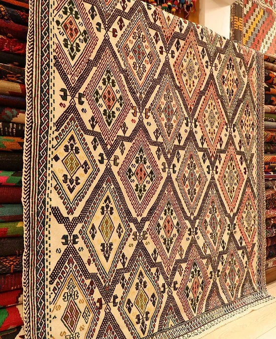 diamond patterned Turkish handmade oriental rug in ivory tones