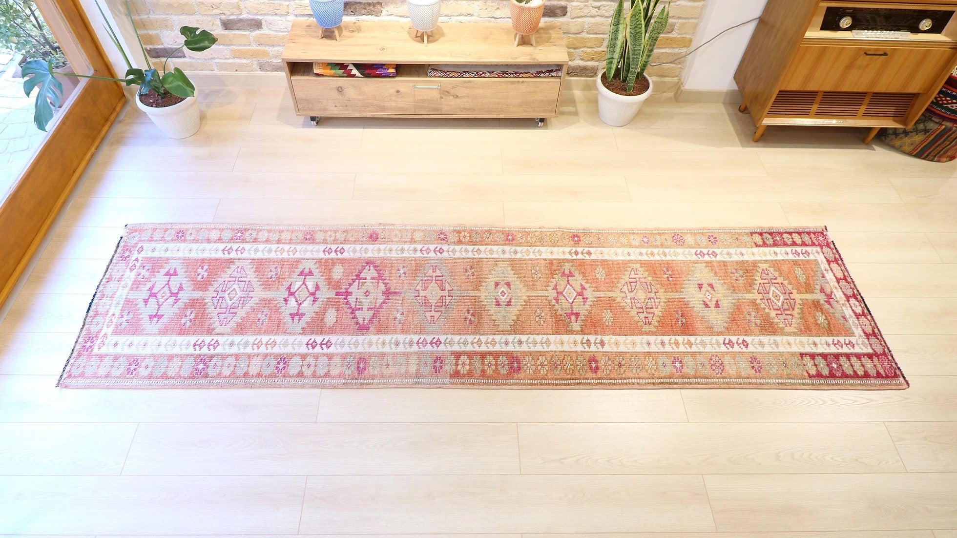 Gorgeous floral Oushak gallery oriental rug from Ushak in earthy, muted and pastel tones with geometric patterns