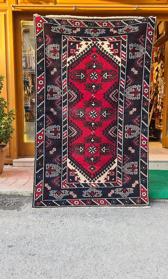 Vintage Dosemealti Oriental Rug from 1960s-1970s, 4x6 ft, handwoven in Antalya, Turkey, with Gordes knot. Features earthy tones of crimson, terracotta, beige, and blue with black accents, made from natural wool.