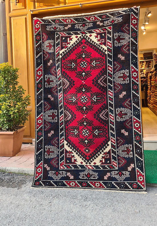 Vintage Dosemealti Oriental Rug from 1960s-1970s, 4x6 ft, handwoven in Antalya, Turkey, with Gordes knot. Features earthy tones of crimson, terracotta, beige, and blue with black accents, made from natural wool.
