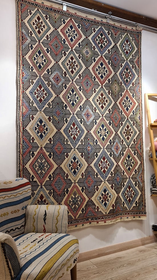 One-of-a-kind Vintage Tapestry with hand-spun wool and natural dyes, offering a blend of geometric artistry and cultural symbolism.