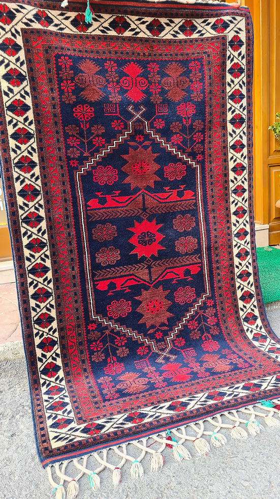 Vintage Yagcibedir Oriental Rug from Balikesir, Turkey, 4x6 ft Hand-knotted by Yuruk artisans using natural wool and dyes, this floral runner features a harmonious burgundy and navy palette with intricate floral motifs and a refined border. Perfect for hallways, entryways, kitchens, or living spaces, this heirloom-quality piece combines timeless artistry, durability, and Anatolian heritage.