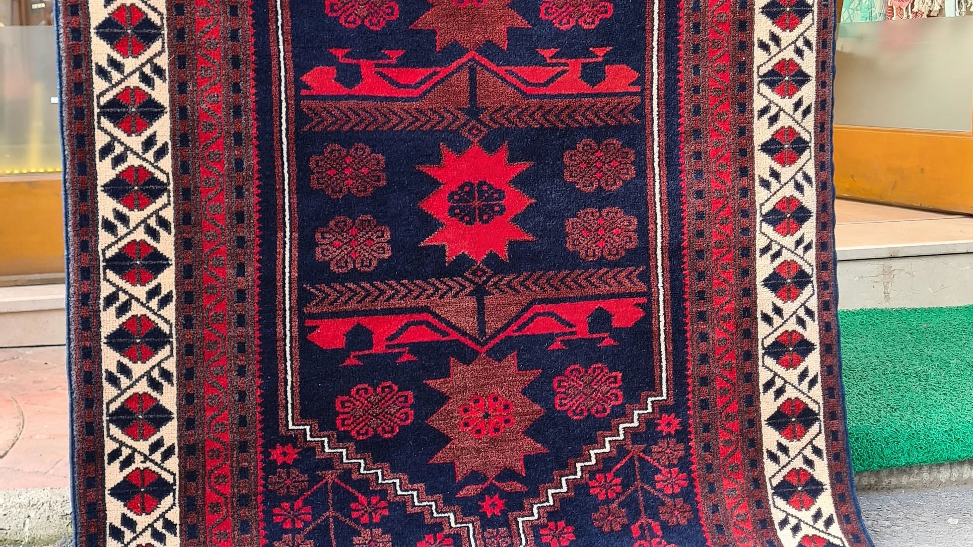 Vintage Yagcibedir Oriental Rug from Balikesir, Turkey, 4x6 ft Hand-knotted by Yuruk artisans using natural wool and dyes, this floral runner features a harmonious burgundy and navy palette with intricate floral motifs and a refined border. Perfect for hallways, entryways, kitchens, or living spaces, this heirloom-quality piece combines timeless artistry, durability, and Anatolian heritage.